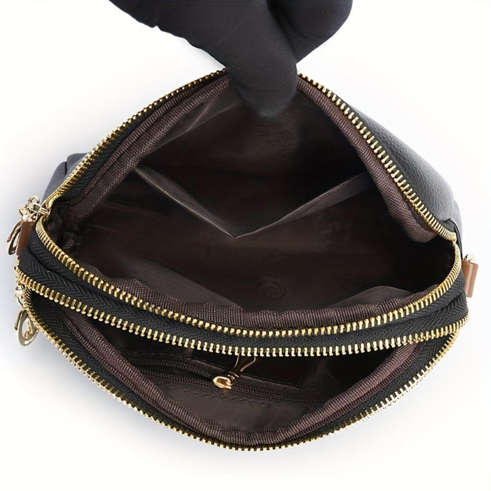 Mila – Compacte Litchi-Relief Schoudertas met Moderne Uitstraling