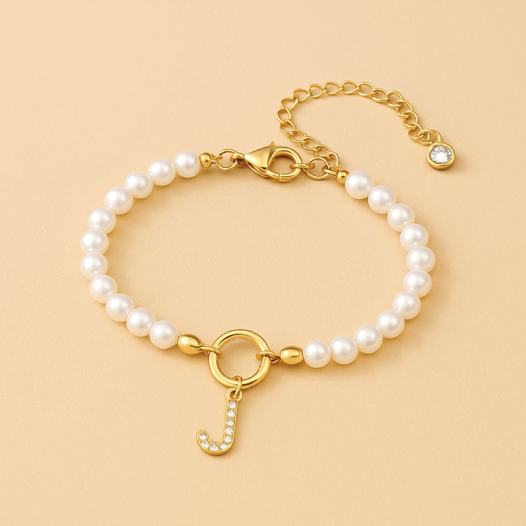 Auden Clé Letterbedel Armband in Goud